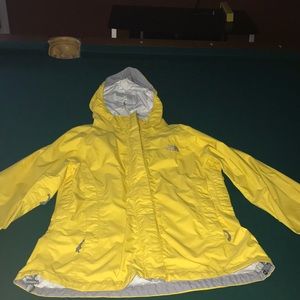 Yellow north face wind-breaker